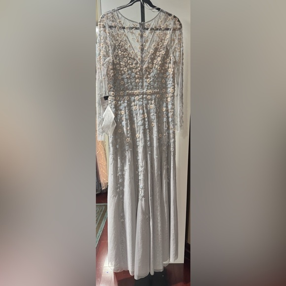 Embellished wrap over illusion long sleeve gown - Picture 8 of 9